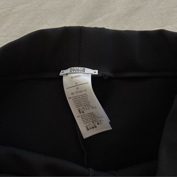 WOLFORD Midnight Grace Leggings - Front Slit Hem in Solid Black - Picture 10 of 10